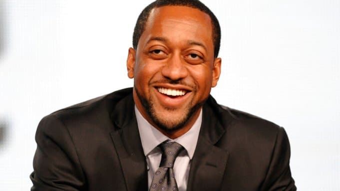 Jaleel White in a suit smiling.