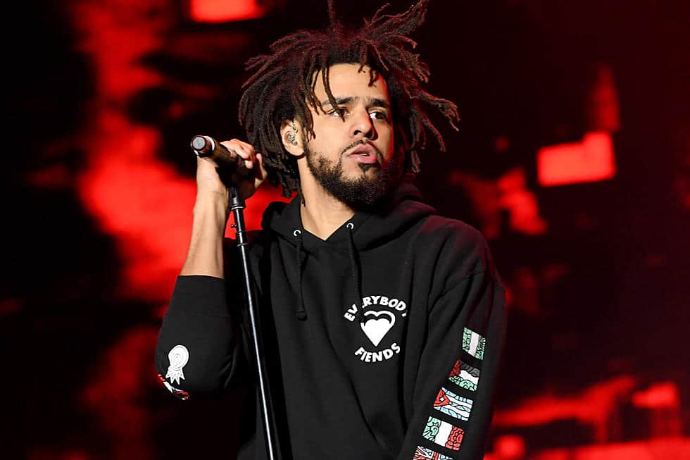J.Cole performing at a concert