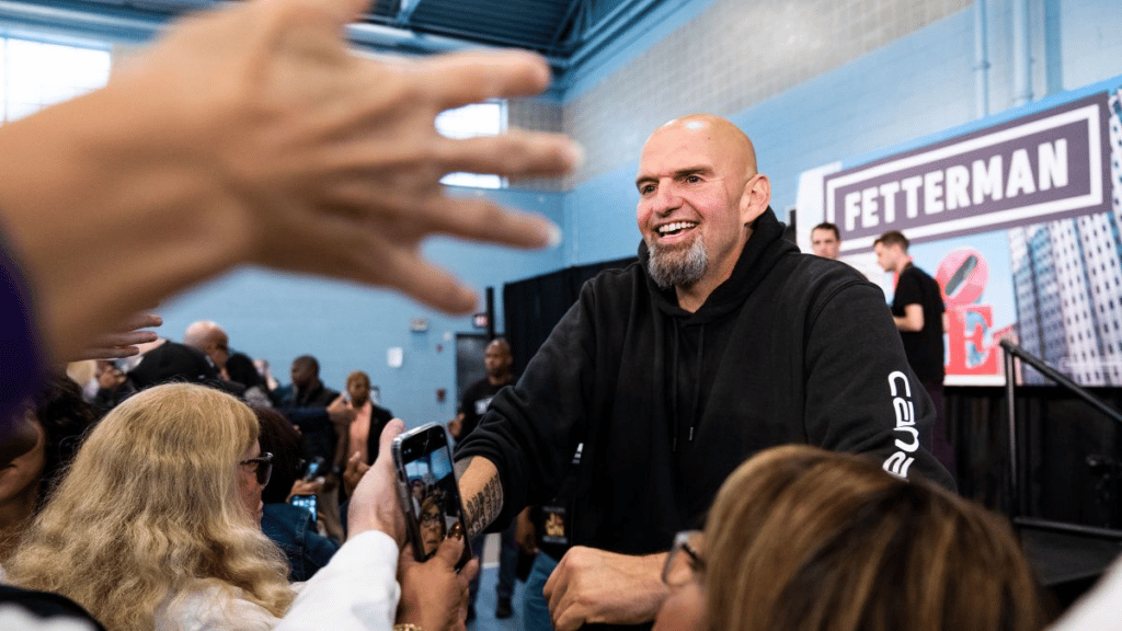 John Fetterman, Democrat nominee for Senate, greets supporters during a campaign rally at the Dorothy Emanuel Recreation Center