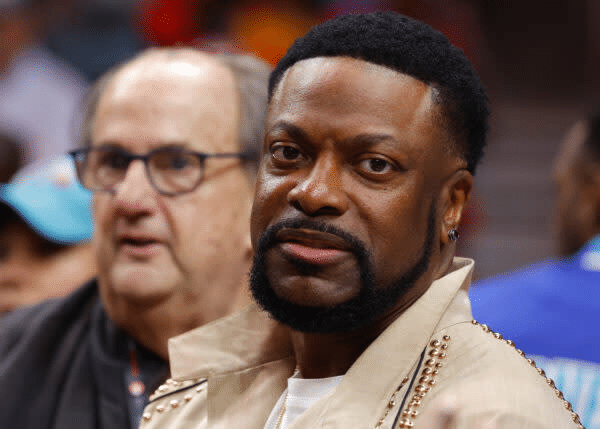 Chris Tucker attends the 2022 play in game between the Charlotte Hornets and Atlanta Hawks at State Farm Arena 