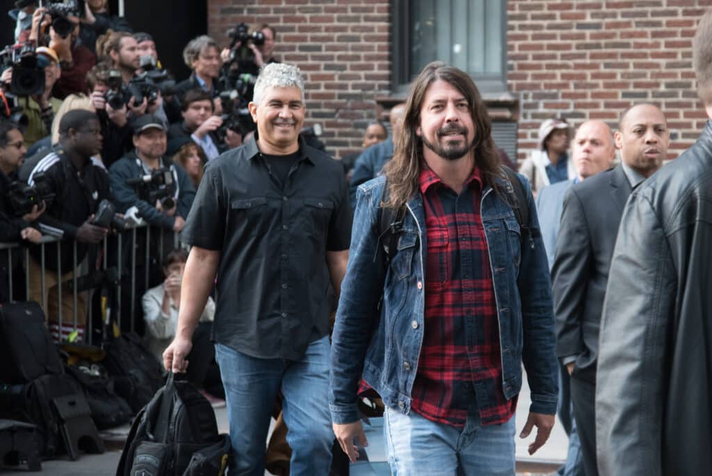 David Grohl and Pat Smear of Foo Fighters leaving the Ed Sullivan Theater after their performance on the final episode of Late Night With David Letterman