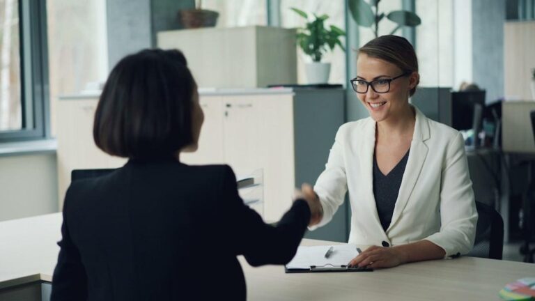 A business professional consulting a legal advisor